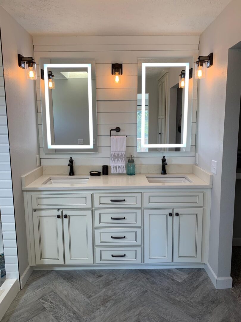 White walls and bathroom sink and cabinetry